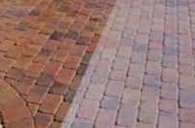 Professional paver cleaning service in Florida restoring brick walkway by removing dirt, moss, and stains.